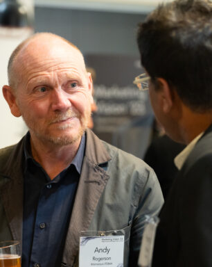 Senior marketing leaders networking at thought leadership event